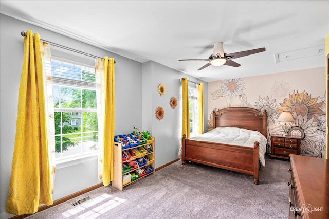 1118 Golden Oaks Pkwy, Aurora, IL 60506 - carpeted bedroom with multiple windows, ceiling fan, and baseboards