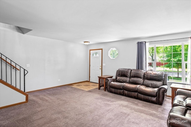 1118 Golden Oaks Pkwy, Aurora, IL 60506 - living room featuring carpet floors, stairway, and baseboards