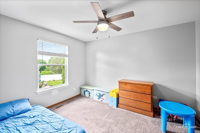 1118 Golden Oaks Pkwy, Aurora, IL 60506 - bedroom with carpet flooring, baseboards, and ceiling fan