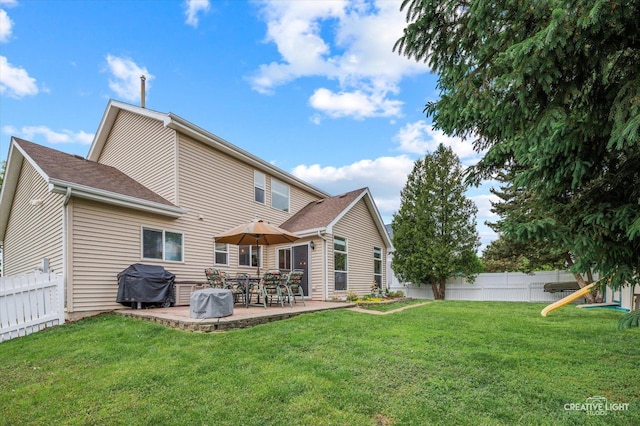 1118 Golden Oaks Pkwy, Aurora, IL 60506 - rear view of property with a patio