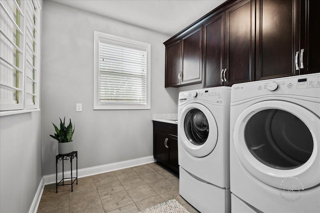 39W729 N Hathaway Ln, Geneva, IL 60134 - laundry area featuring cabinet space, independent washer and dryer, and baseboards