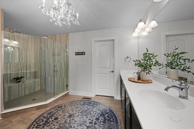 39W729 N Hathaway Ln, Geneva, IL 60134 - full bath with a notable chandelier, a sink, double vanity, baseboards, and a shower stall