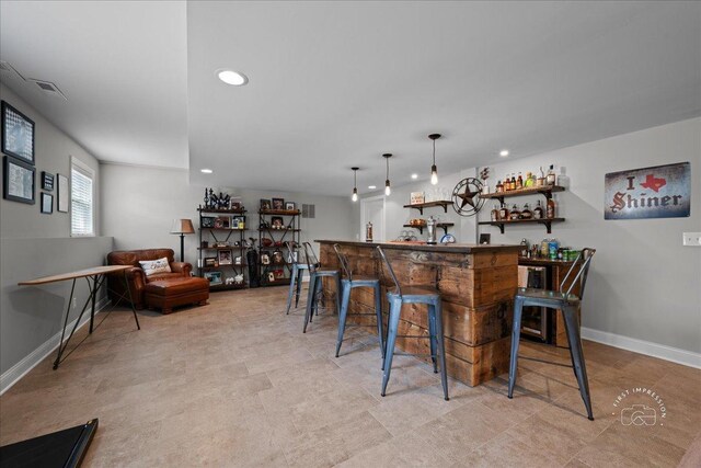 39W729 N Hathaway Ln, Geneva, IL 60134 - bar featuring recessed lighting, wet bar, visible vents, and baseboards