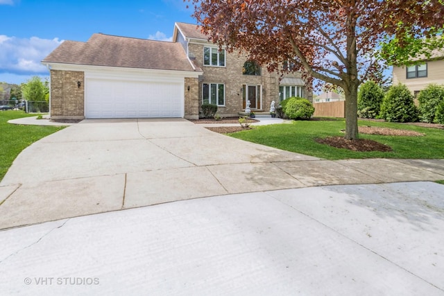 1188 Parkview Ct, Carol Stream, IL 60188 - colonial-style house with brick siding, fence, an attached garage, concrete driveway, and a front lawn