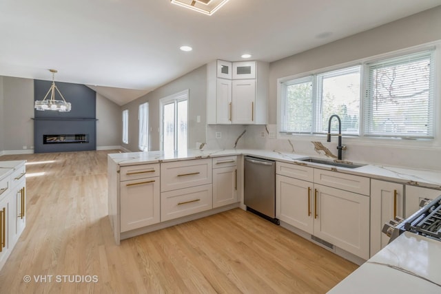 1188 Parkview Ct, Carol Stream, IL 60188 - kitchen featuring a sink, light stone counters, light wood-style flooring, white cabinets, and stainless steel dishwasher