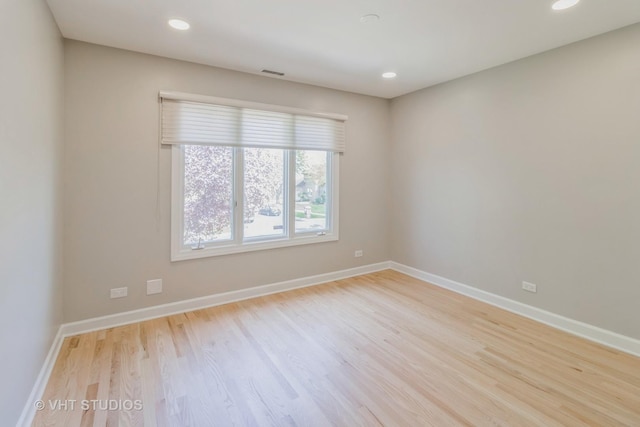 1188 Parkview Ct, Carol Stream, IL 60188 - unfurnished room featuring visible vents, wood finished floors, baseboards, and recessed lighting