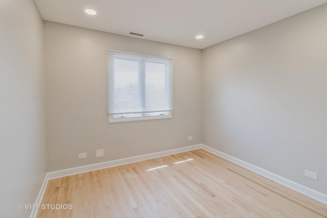 1188 Parkview Ct, Carol Stream, IL 60188 - spare room with wood finished floors, visible vents, baseboards, and recessed lighting