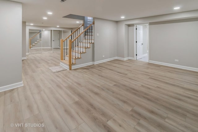 1188 Parkview Ct, Carol Stream, IL 60188 - finished below grade area with light wood finished floors, stairs, baseboards, and recessed lighting