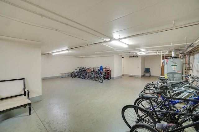 5328 W Windsor Ave Unit 1H, Chicago, IL 60630 - garage featuring baseboards and gas water heater