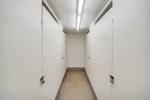 5328 W Windsor Ave Unit 1H, Chicago, IL 60630 - corridor with finished concrete flooring and baseboards