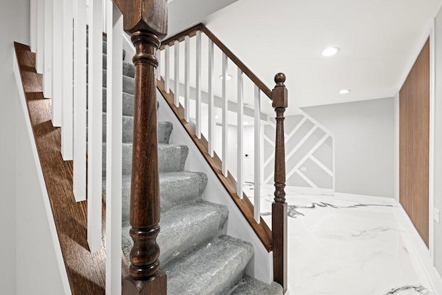 staircase featuring recessed lighting