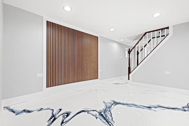 interior space with recessed lighting, marble finish floor, stairs, and baseboards