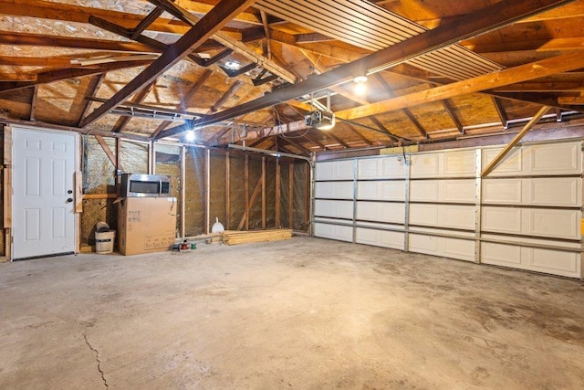 garage featuring a garage door opener