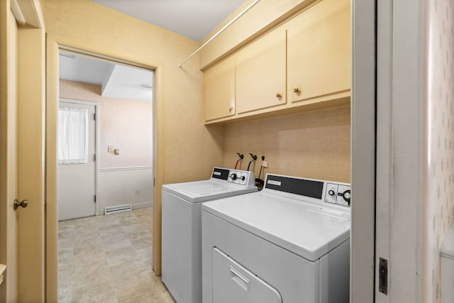 washroom with visible vents, independent washer and dryer, cabinet space, and wallpapered walls