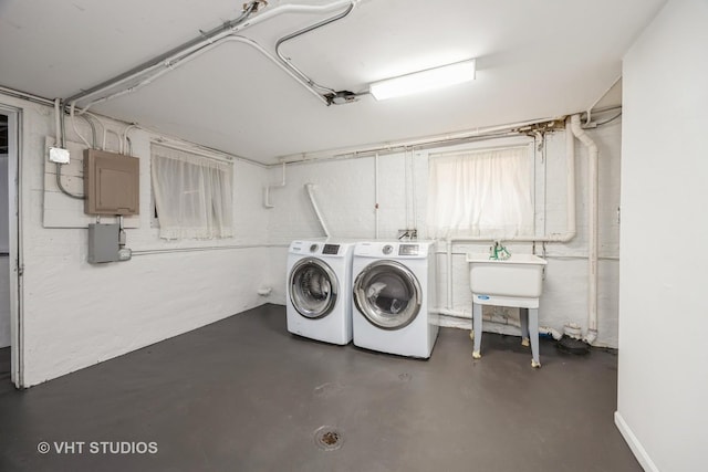 clothes washing area featuring laundry area and washer and dryer