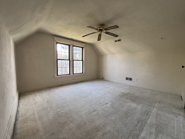 bonus room with visible vents, ceiling fan, carpet, and lofted ceiling