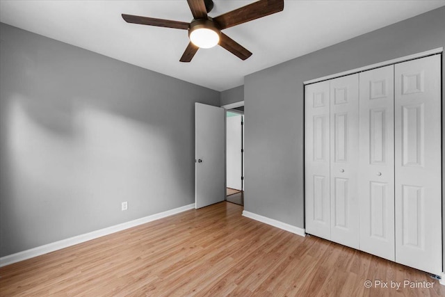 5214 Abbey Dr, Mchenry, IL 60050 - unfurnished bedroom with baseboards, light wood-style floors, a closet, and ceiling fan