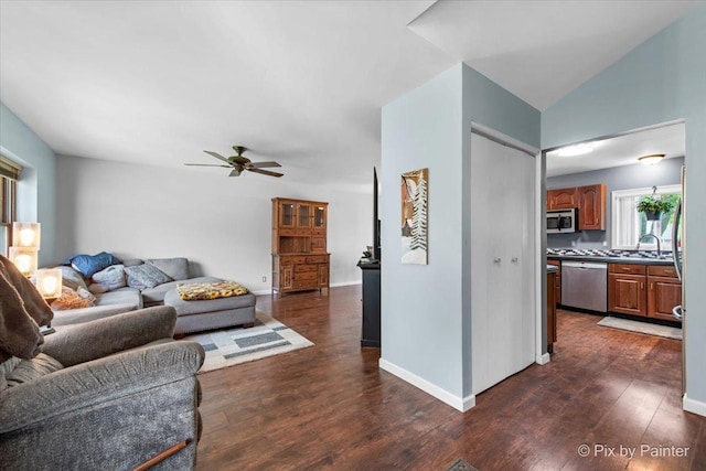 5214 Abbey Dr, Mchenry, IL 60050 - living room featuring dark wood-style floors, a ceiling fan, and baseboards