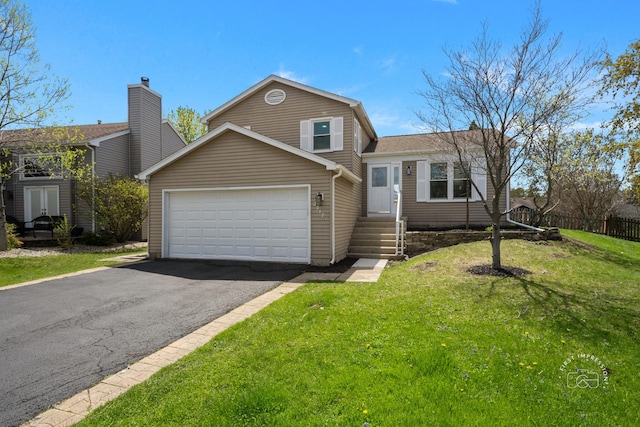 view of front of home with a garage, fence, aphalt driveway, and a front lawn