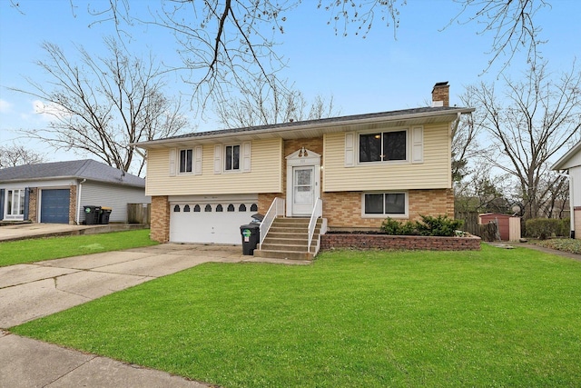 511 Freeman Ave, Streamwood, IL 60107 - bi-level home with a front lawn, brick siding, driveway, and a chimney