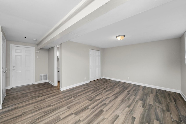 511 Freeman Ave, Streamwood, IL 60107 - finished basement with baseboards, visible vents, and dark wood-style floors