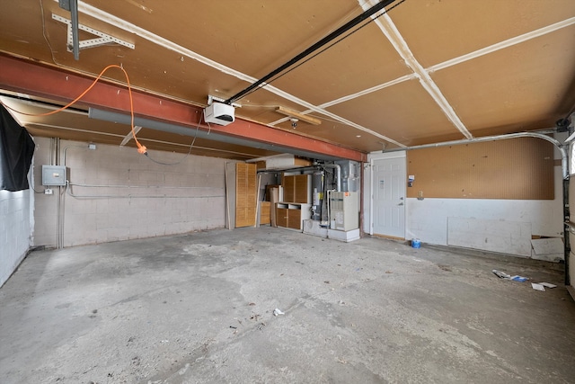 511 Freeman Ave, Streamwood, IL 60107 - garage featuring concrete block wall and a garage door opener