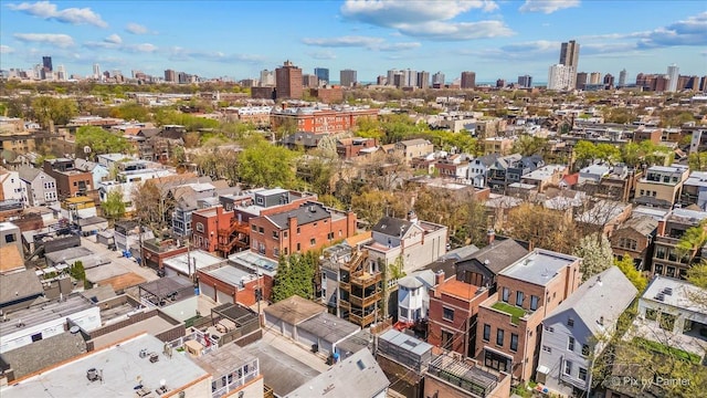 birds eye view of property with a city view