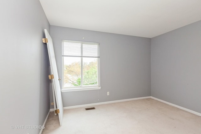 14252 S Hemingway Cir, Plainfield, IL 60544 - empty room with light colored carpet, baseboards, and visible vents