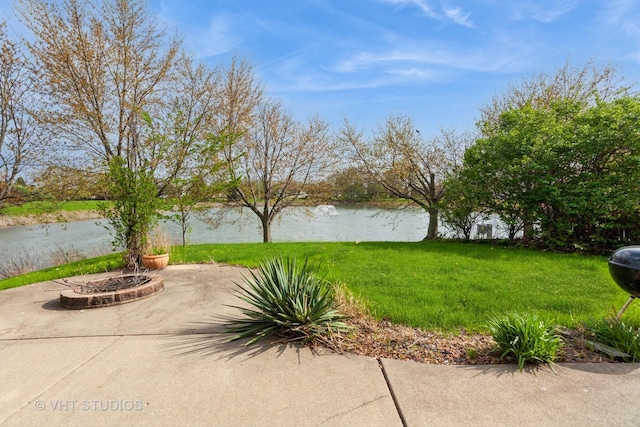14252 S Hemingway Cir, Plainfield, IL 60544 - exterior space with a patio, a water view, and a fire pit