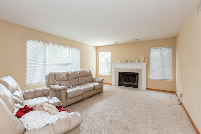 14252 S Hemingway Cir, Plainfield, IL 60544 - carpeted living area featuring baseboards, a fireplace, and visible vents