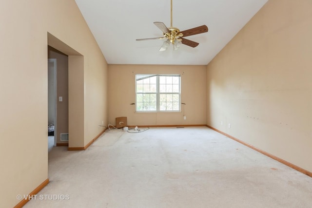 14252 S Hemingway Cir, Plainfield, IL 60544 - unfurnished room featuring a ceiling fan, visible vents, vaulted ceiling, carpet floors, and baseboards