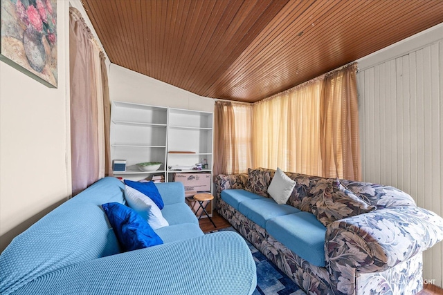 living area with wood ceiling, wood finished floors, and lofted ceiling
