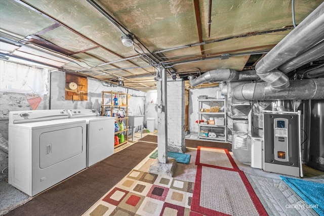 basement with washer and clothes dryer