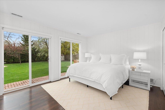 273 Eaton St, Northfield, IL 60093 - bedroom with access to outside, visible vents, and wood finished floors