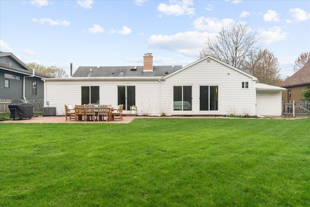 273 Eaton St, Northfield, IL 60093 - rear view of property featuring a yard, a patio area, and fence