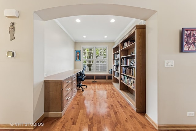 1178 Drury Ln, Aurora, IL 60502 - home office with crown molding, light wood-style floors, baseboards, recessed lighting, and arched walkways