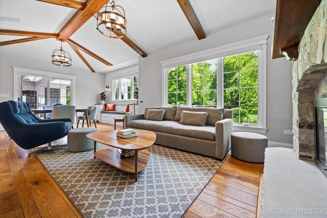 7S361 Arbor Dr, Naperville, IL 60540 - living area with lofted ceiling with beams, hardwood / wood-style flooring, and a notable chandelier