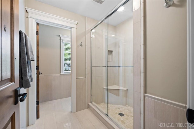 7S361 Arbor Dr, Naperville, IL 60540 - bathroom with a shower stall and a wainscoted wall