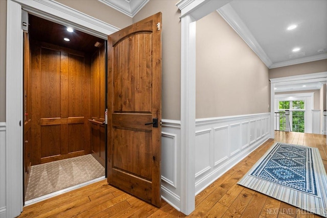 7S361 Arbor Dr, Naperville, IL 60540 - hall with elevator, hardwood / wood-style flooring, crown molding, and wainscoting