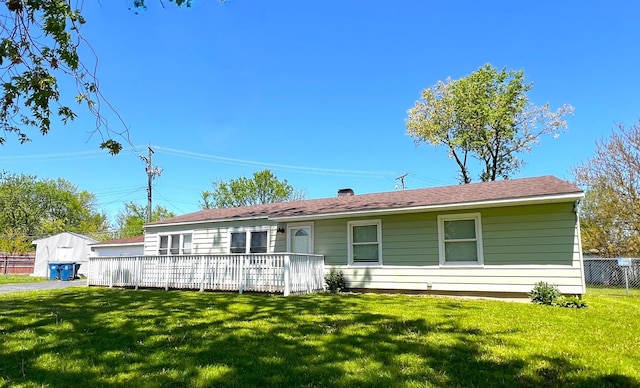 view of front of house featuring a chimney