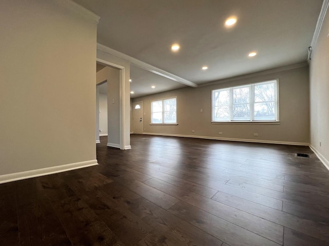 spare room with crown molding, baseboards, dark wood-style flooring, and recessed lighting