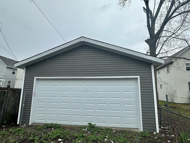 detached garage with fence