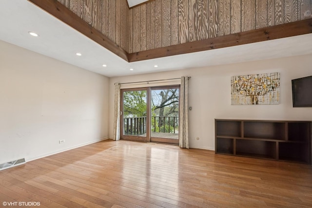 23460W N Lakewood Ln, Lake Zurich, IL 60047 - unfurnished living room featuring a towering ceiling, visible vents, recessed lighting, wood-type flooring, and baseboards