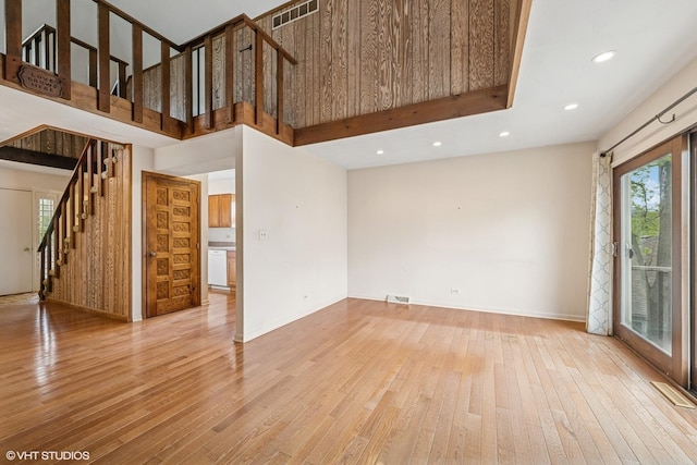 23460W N Lakewood Ln, Lake Zurich, IL 60047 - unfurnished living room featuring stairs, recessed lighting, visible vents, and light wood-style floors
