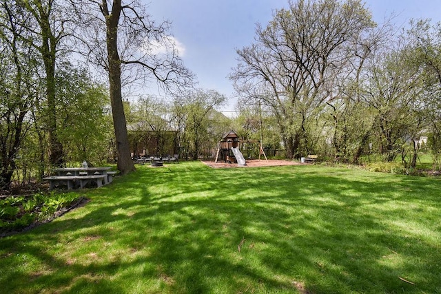 view of yard with a playground