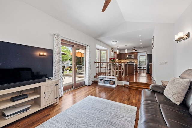 1267 Churchill Rd, Bartlett, IL 60103 - living room featuring a ceiling fan, vaulted ceiling, and dark wood-type flooring