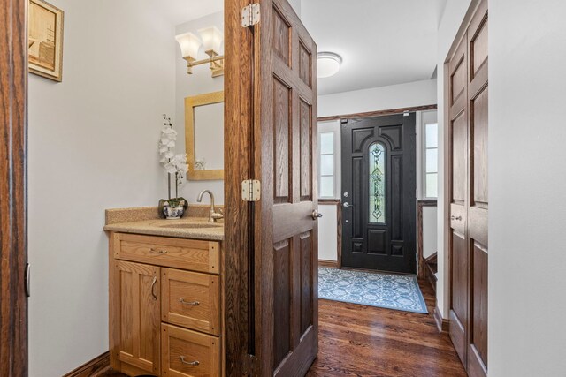1267 Churchill Rd, Bartlett, IL 60103 - foyer entrance featuring dark wood-style floors and baseboards