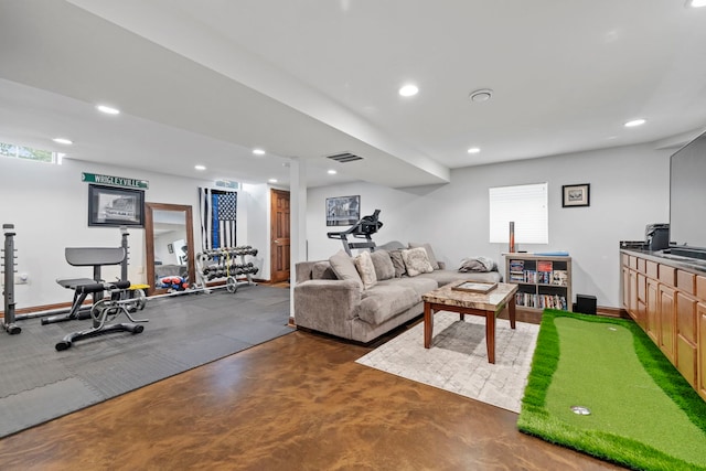 1267 Churchill Rd, Bartlett, IL 60103 - living room featuring finished concrete flooring and recessed lighting