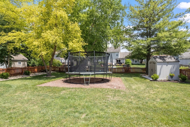 1267 Churchill Rd, Bartlett, IL 60103 - fenced backyard featuring a trampoline and a storage shed