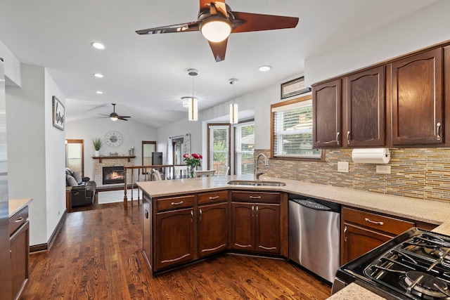 1267 Churchill Rd, Bartlett, IL 60103 - kitchen with ceiling fan, stainless steel dishwasher, gas stove, a peninsula, and decorative backsplash